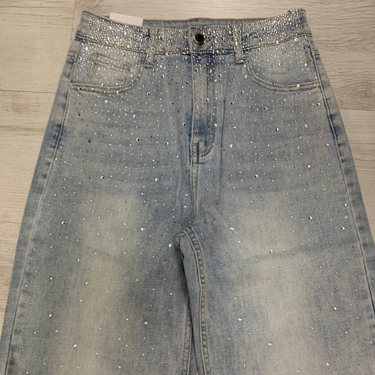 JEANS CHIARI CON CASCATA DI STRASS